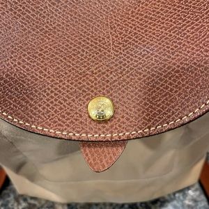 Long champ tan backpack